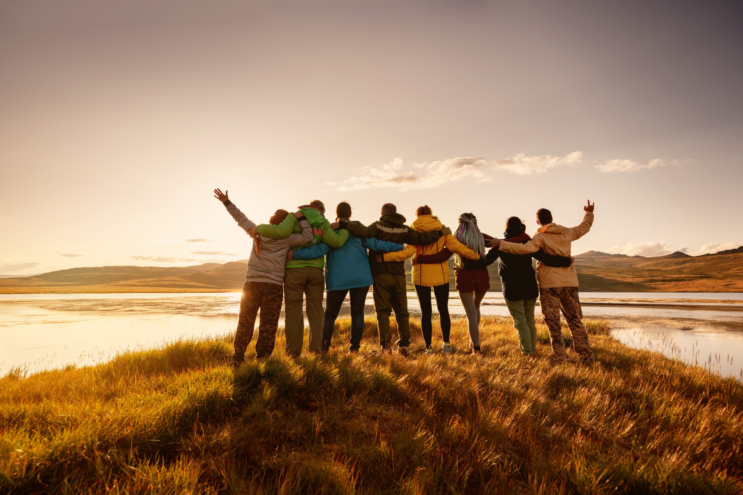 group of hikers celebrating end of long day